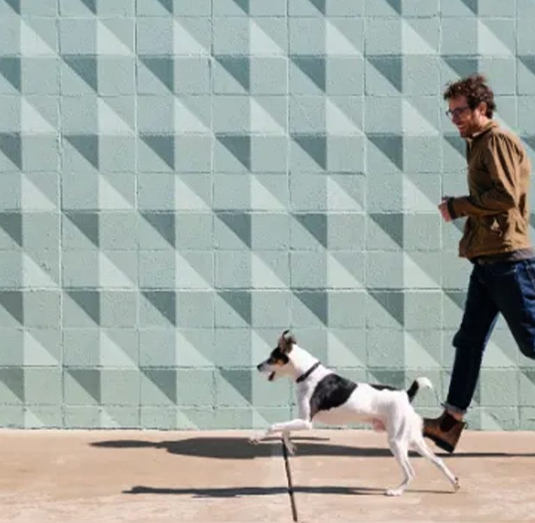 Man running with his dog