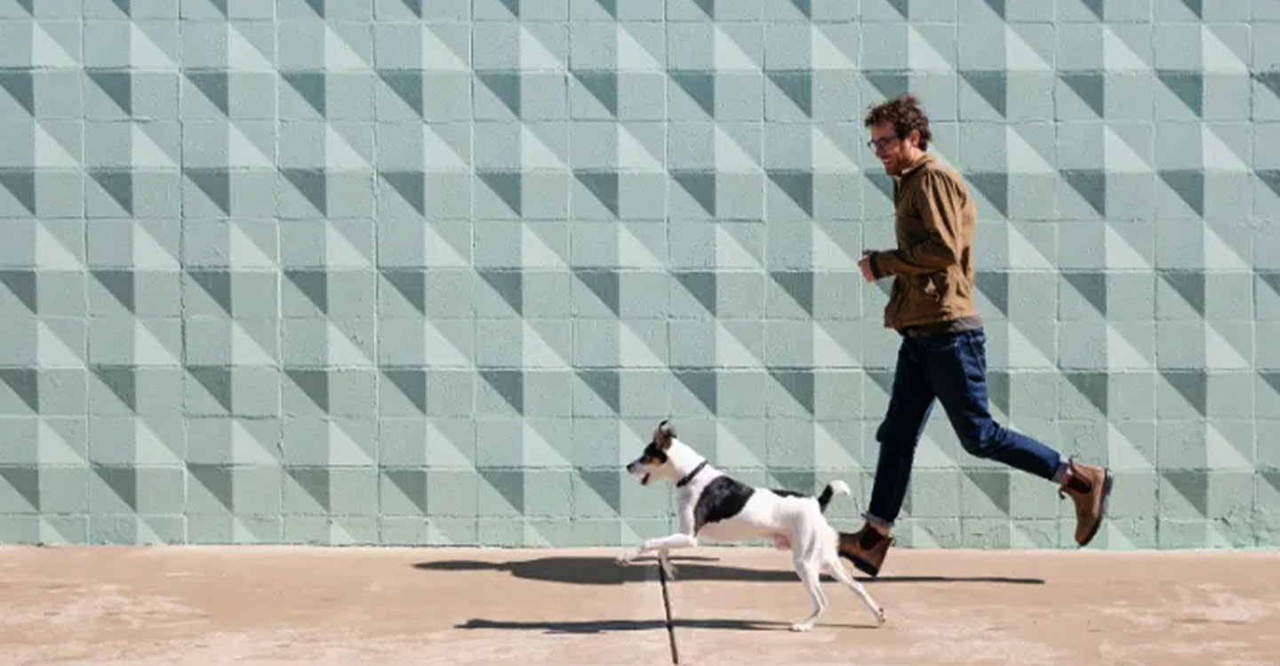 Man running with his dog