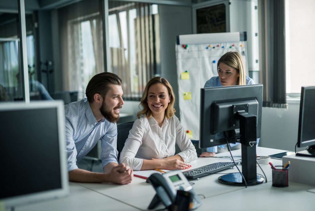 A team discussing low-code projects